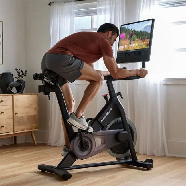 NordicTrack S24 Spinning Bike 2025 Model - NTEX24125-INT | 24" Pivoting Touchscreen, Silent Magnetic Resistance, AutoBreeze™ Fan, Bluetooth Connectivity, 350 lb Capacity